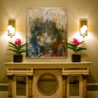 Buffet table frames a display area for artwork, Thomas Burak Interiors, NYC