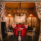 Tent with furniture, lighting and flowers at NYC Mount Vernon Show House