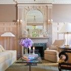 Refined modern furniture and neutral colors creates a comfortable living room in one of New York's most celebrated Italian Renaissance Revival buildings 